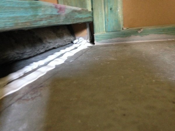 Caulk-seal-under-wall-sole-plate..jpg